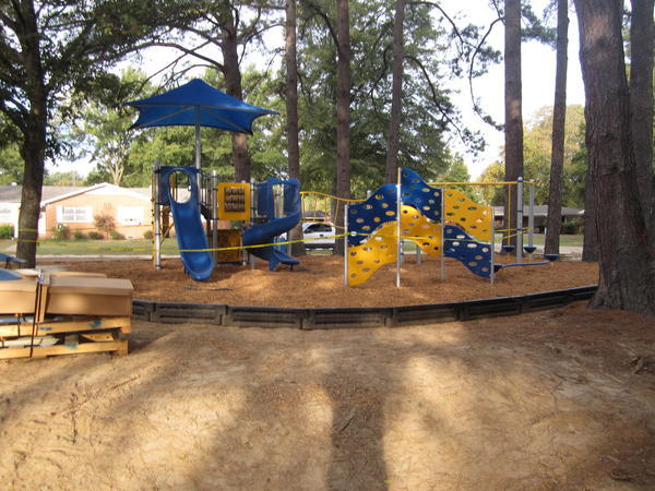 Yellow and blue playground equipment