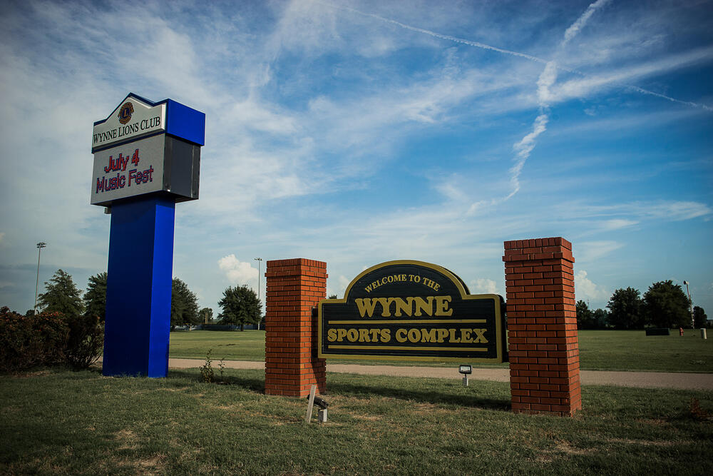 the sports complex entrance sign